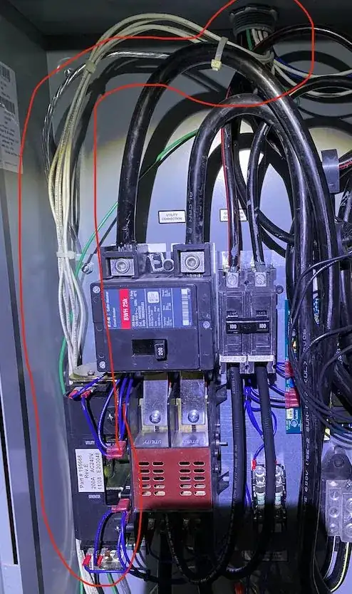 Generator panel ground exiting the house via conduit at the top