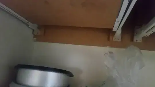 Close up of the fastener where the overflow connects to the HVAC system