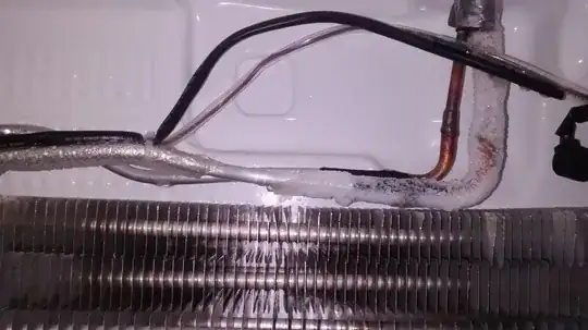 picture of frost buildup on pipe next to evaporator coils