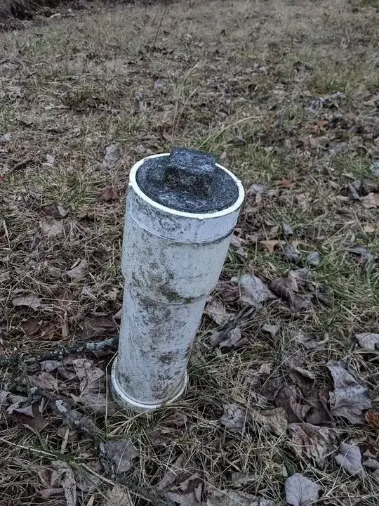White pipe near road