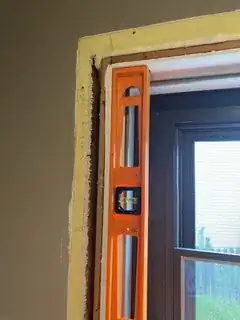 upper door jamb, latch side, with level