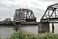 BNSF Railway bridge across the Columbia River at Portland, Oregon, showing the swing-span section turning.