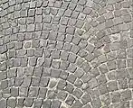 Square setts in an arc pattern