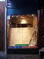 A carpet shop in Turkey that offers to speak with customers in Catalan (ca), Italian (it), and Spanish (es)