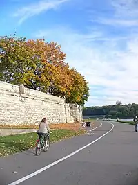 Segregated cycle- and footway by a painted line.