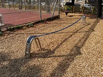 A balance_rope consisting of three smaller, tied ropes. Since there is no railing/tether/rope to hold on to, handrail=no can be added.