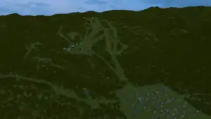 An area with wooded mountains near the city of Yuzhno-Sakhalinsk (Sakhalin island).