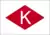 Weißes "K" in roter Raute auf weißem Grund