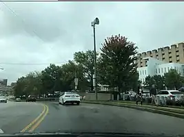 Pole-mounted tornado siren in the United States, identifiable by the logo on the horn:emergency=sirensiren:purpose=tornadosiren:type=electronicmanufacturer=American Signal Corporationmanufacturer:wikidata=Q4744989siren:model=T-128 man_made=masttower:type=sirensupport=pole