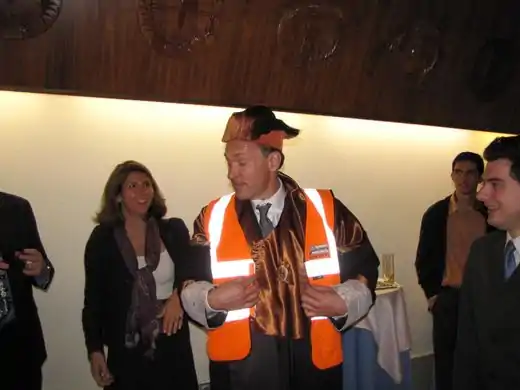 Tim Berners-Lee being presented with an OSM vest